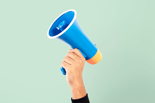 hand-holding-megaphone-marketing-announcement-campaign